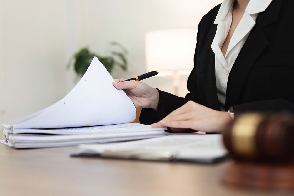 Lawyer reviewing legal documents in an office