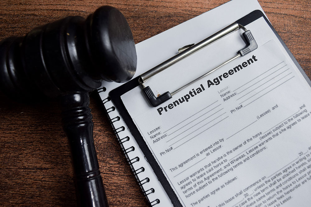 Prenuptial agreement document on a clipboard